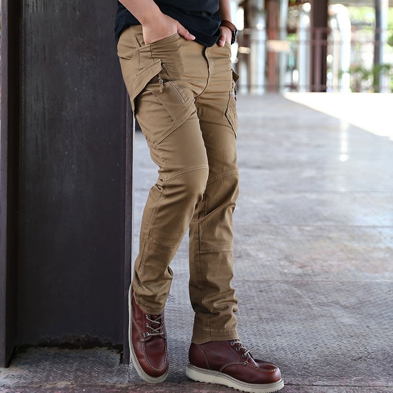Operator wearing the coyote brown Onken IX9 lightweight tactical pants, demonstrating their athletic fit and superior mobility for active professional use.