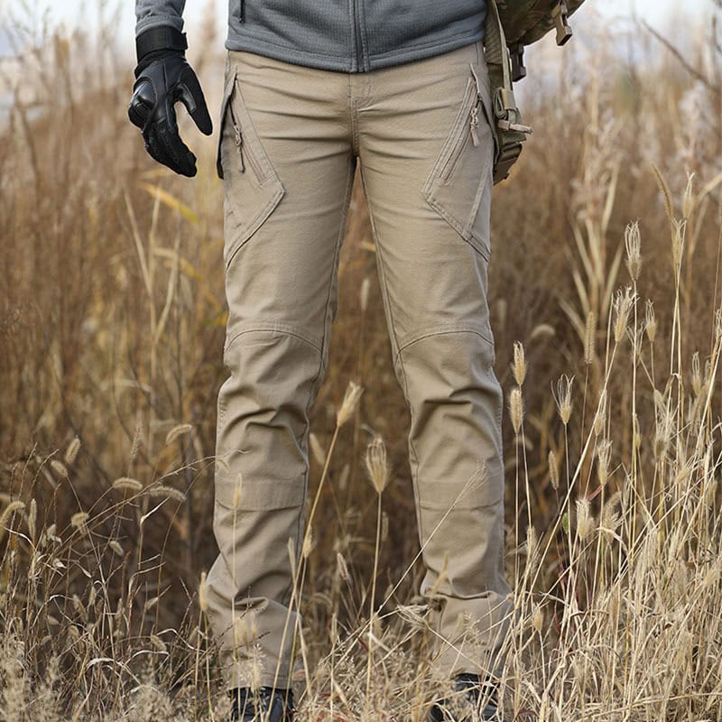 Operator wearing the coyote brown Onken IX9 lightweight tactical pants, demonstrating their athletic fit and superior mobility for active professional use.