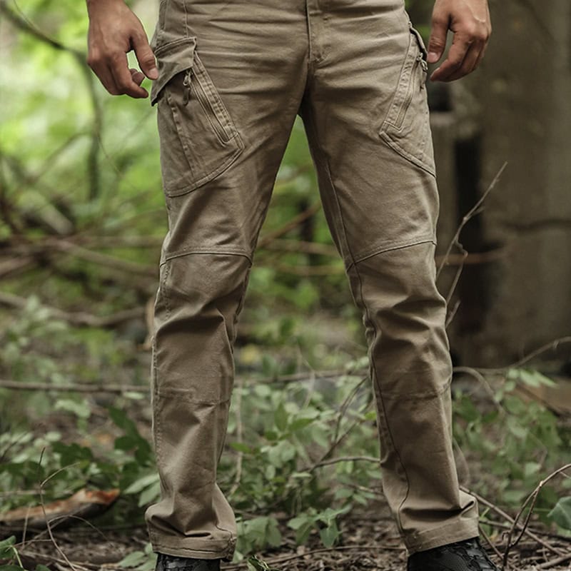 Operator wearing the coyote brown Onken IX9 lightweight tactical pants, demonstrating their athletic fit and superior mobility for active professional use.