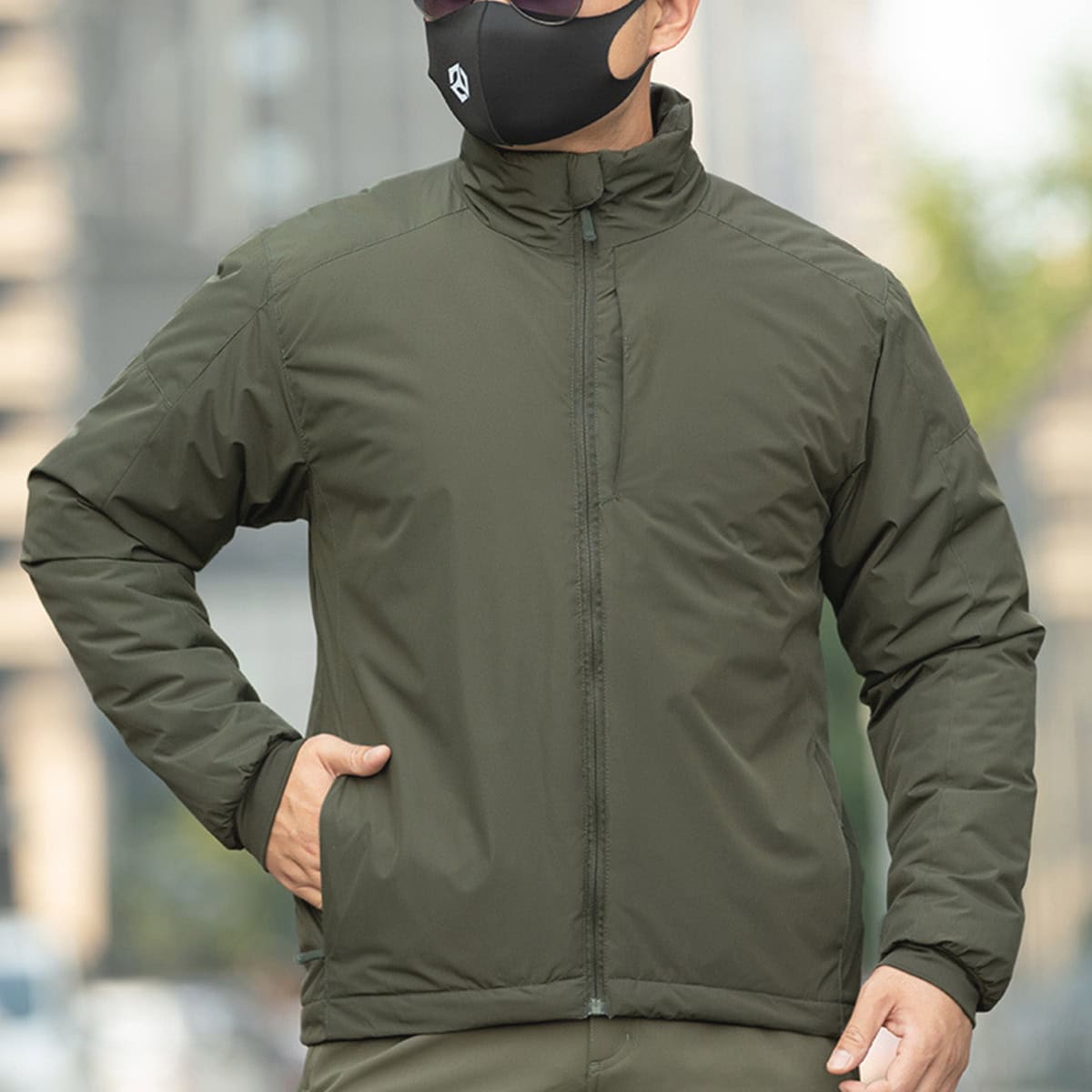 Man wearing the Onken Gen 2 thermal reflective tactical parka, demonstrating its professional fit for security or military use in cold climates.