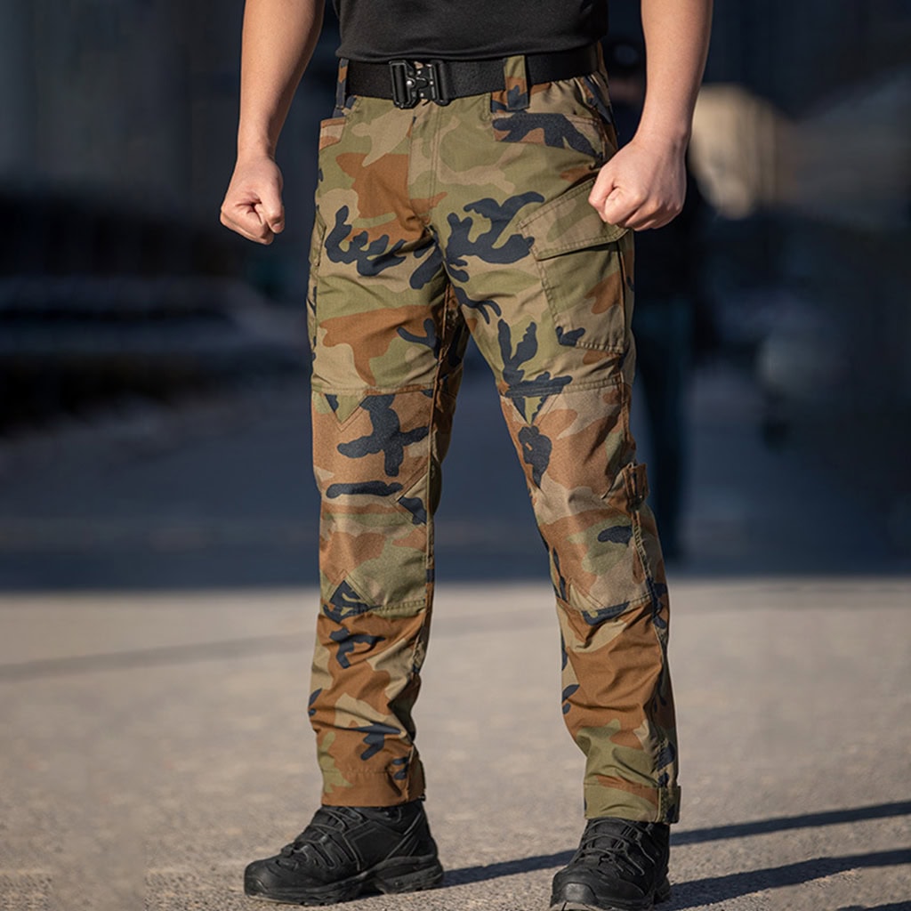 The G3 Combat Pants in woodland camouflage, a combat-proven choice for military units. WHCSJ supplies these for bulk international defense contracts.