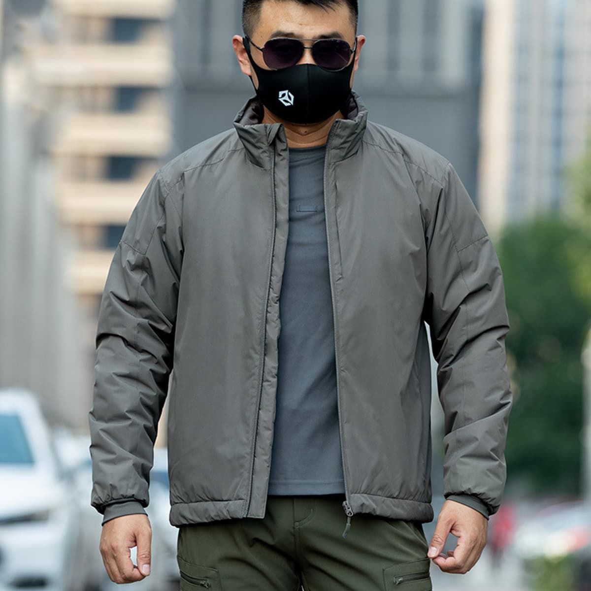 Man wearing the Onken Gen 2 thermal reflective tactical parka, demonstrating its professional fit for security or military use in cold climates.