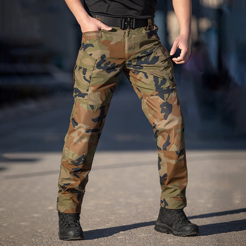 The G3 Combat Pants in woodland camouflage, a combat-proven choice for military units. WHCSJ supplies these for bulk international defense contracts.