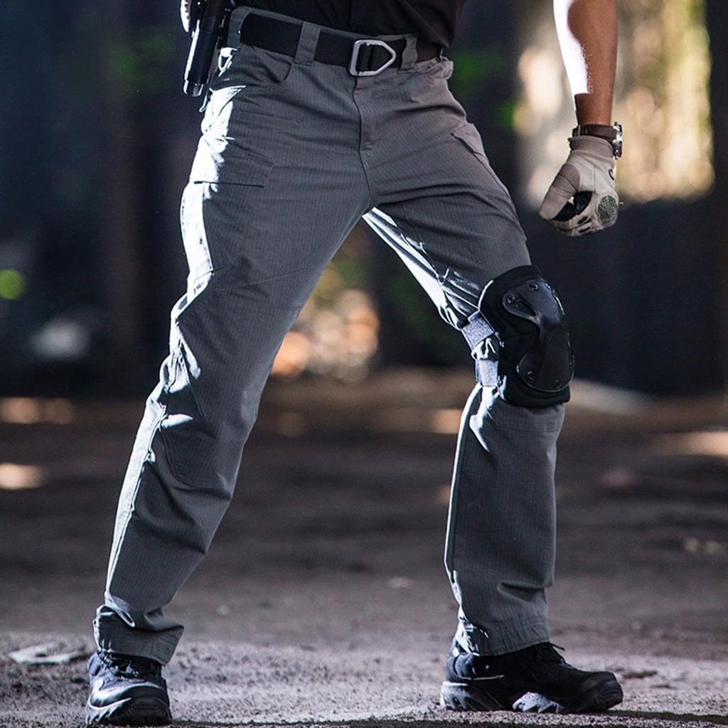 Operator wearing the Thunderbolt Gen 2 tactical pants in a kneeling position, showcasing the flexibility of the 4-way stretch fabric and articulated knees.