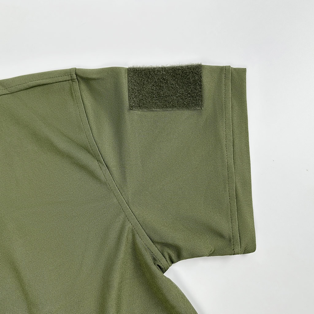 Detail of the bicep sleeve pocket on the performance tactical t-shirt, with a velcro field for attaching unit patches or insignia.
