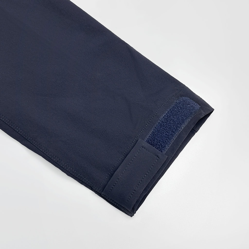 Navy blue flame retardant combat shirt, part of a tactical FROG suit, with shoulder pockets.