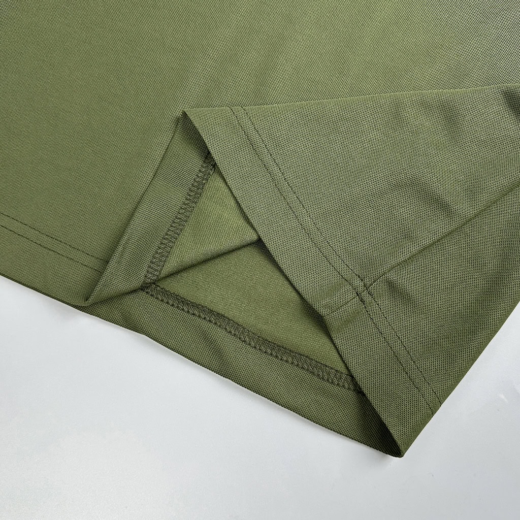 Close-up of the double-stitched hem on the performance tactical t-shirt, engineered for long-term durability and professional use.