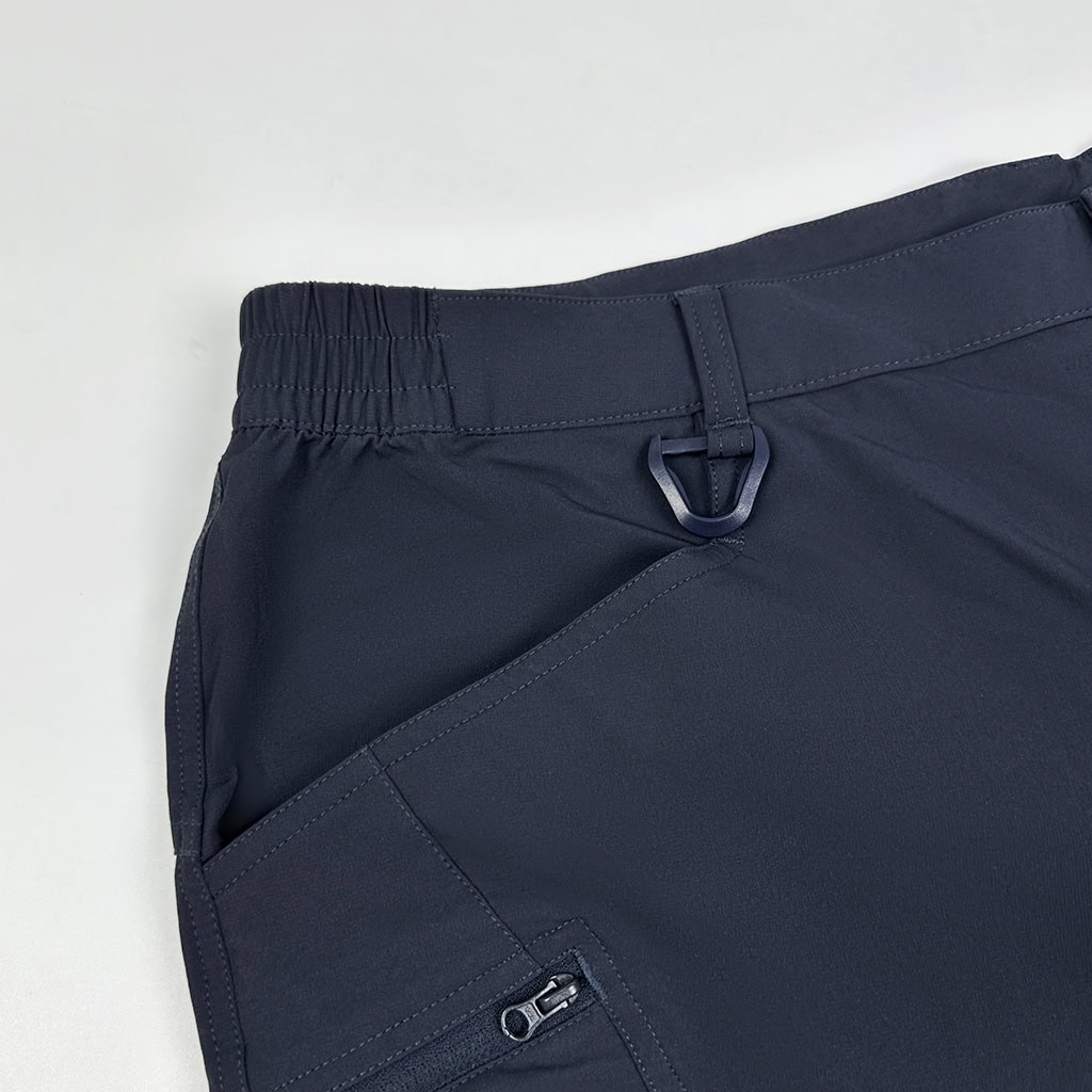 Navy blue flame retardant combat shirt, part of a tactical FROG suit, with shoulder pockets.