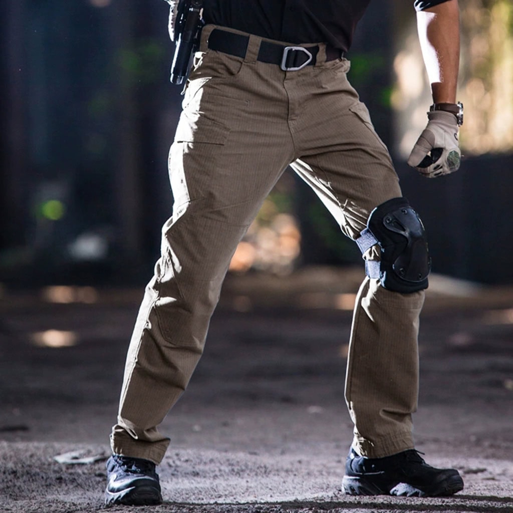 Operator wearing the Thunderbolt Gen 2 tactical pants in a kneeling position, showcasing the flexibility of the 4-way stretch fabric and articulated knees.