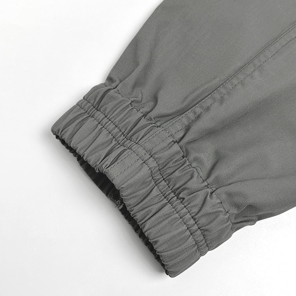 Detail of the elastic ribbed ankle cuff on the Onken tactical jogger pants, ensuring a secure fit and preventing snags.