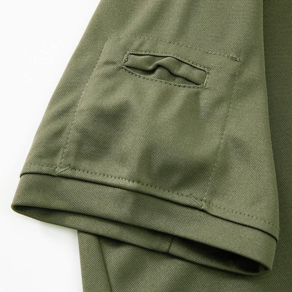 Close-up of the low-profile, flapped bicep pocket on the Onken Performance Tactical T-Shirt, providing secure storage for small items.