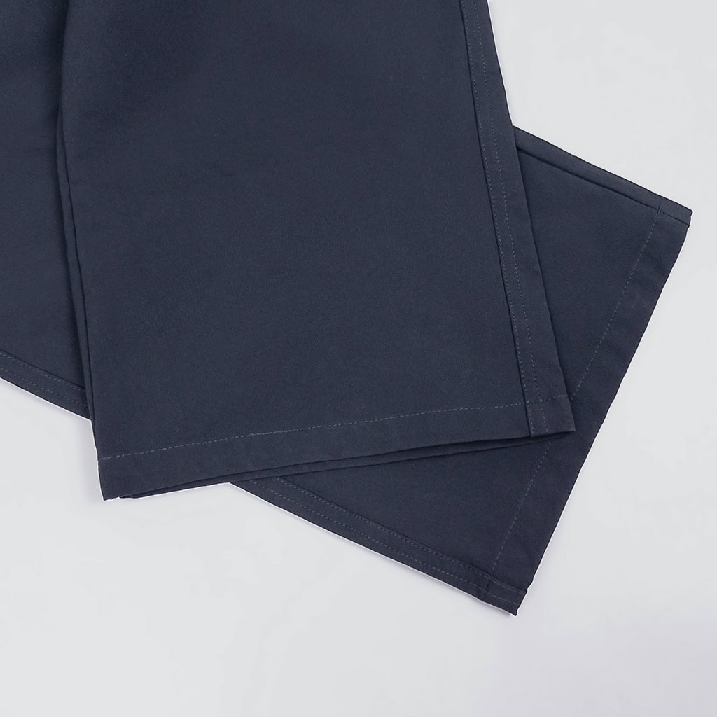 Navy blue flame retardant combat shirt, part of a tactical FROG suit, with shoulder pockets.