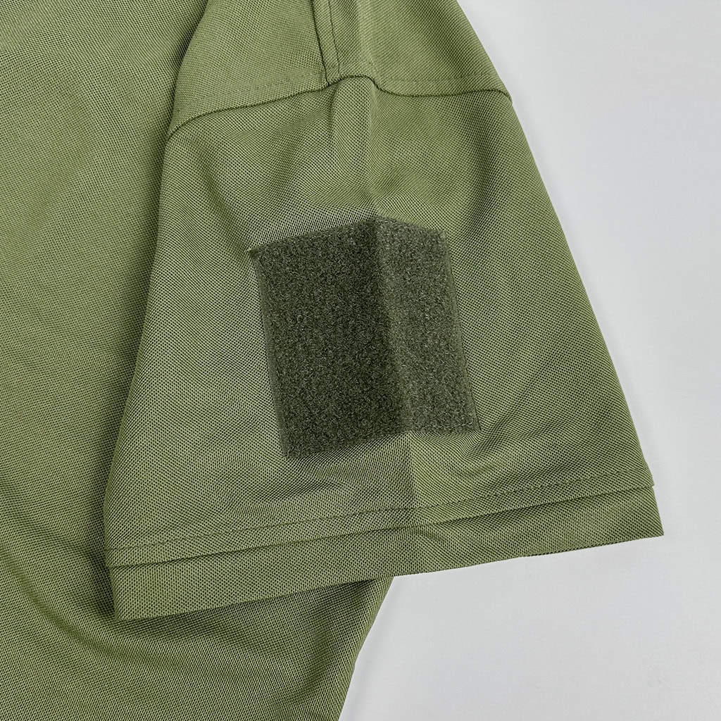 Detail of the bicep sleeve pocket on the performance tactical t-shirt, with a velcro field for attaching unit patches or insignia.