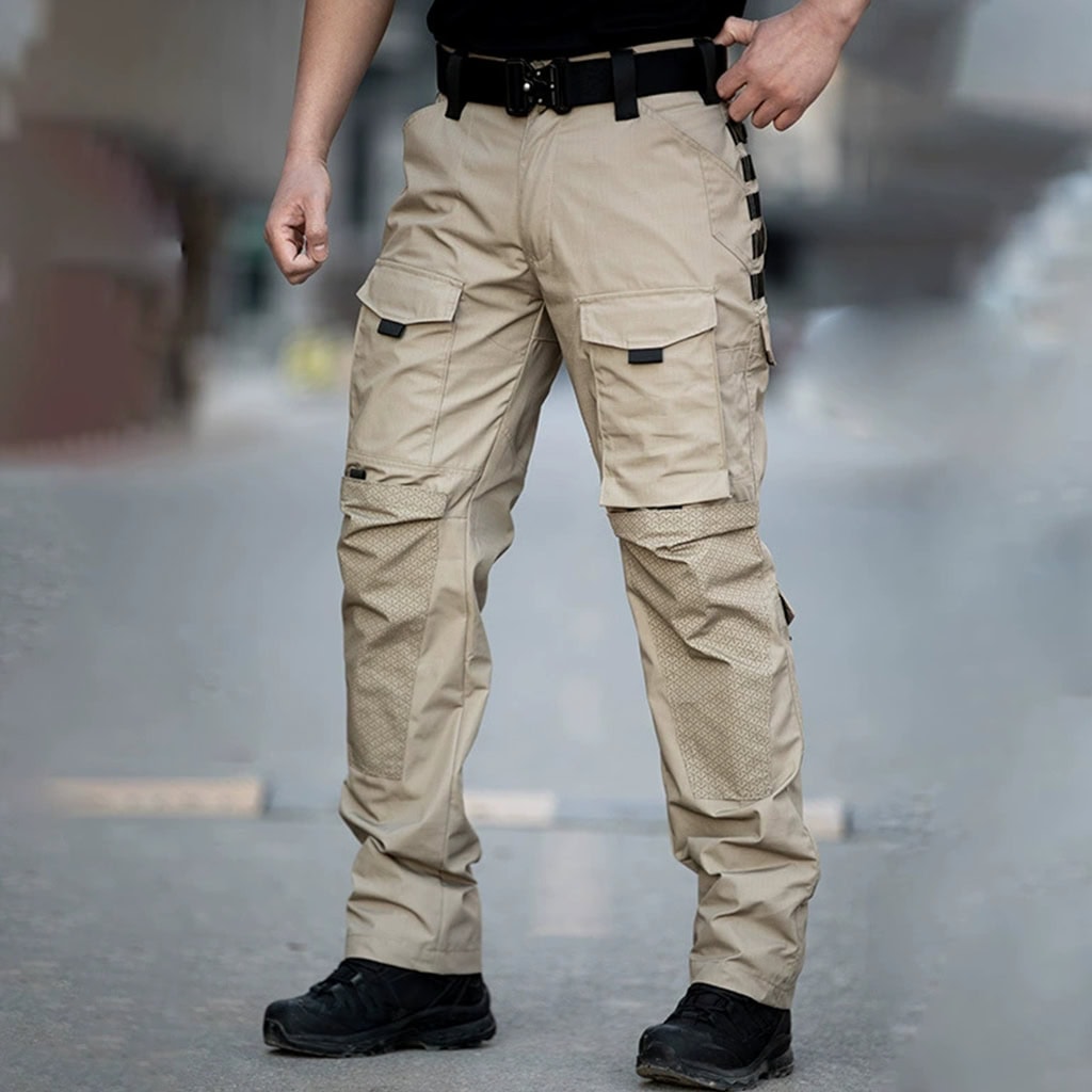 Man wearing the khaki Onken Beetle durable tactical pants, the ideal choice for security contractors and outdoor professionals requiring tough gear.