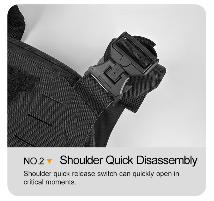 Close-up of the shoulder quick-release buckle on the Vanguard plate carrier, a critical safety feature for emergency doffing.