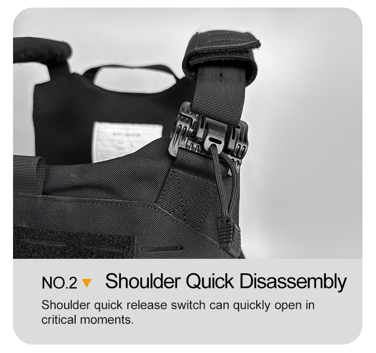 Close-up of the shoulder quick-release buckle on the "Spartan" plate carrier, a critical safety feature for emergency doffing.
