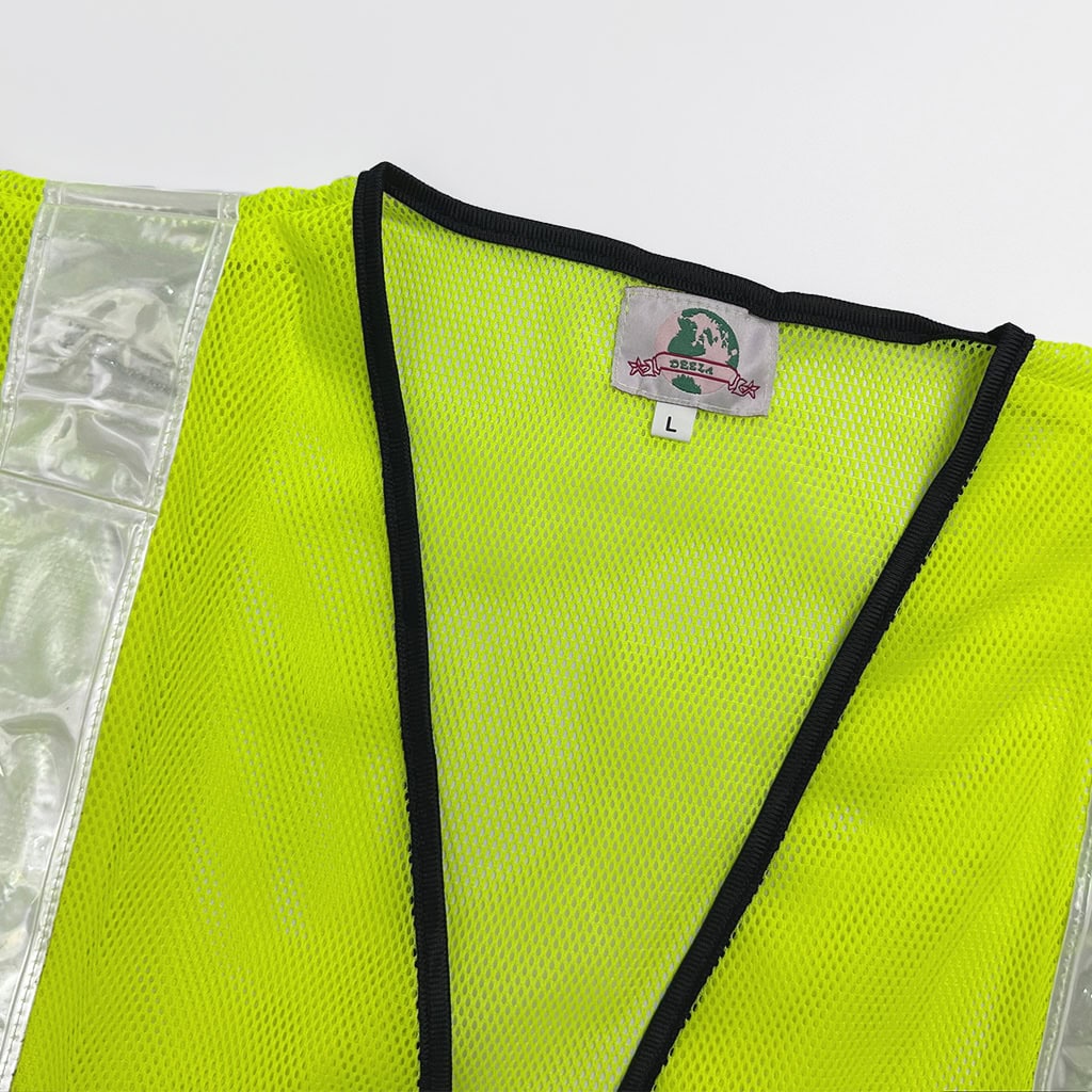 Detail of the ANSI Class 2 safety vest's collar, showing the durable black trim and firm stitching for professional use.