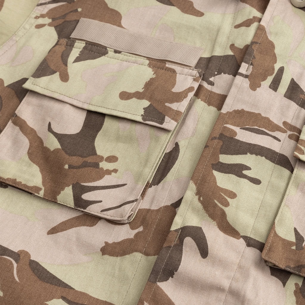 Close-up of the button-flapped bellowed breast pocket on the Sentinel Heavy-Duty Combat Uniform, providing secure storage for gear.