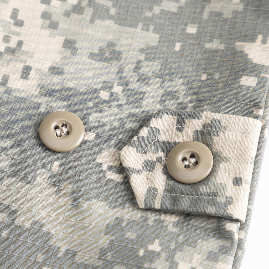 Close-up of the buttoned shoulder tab on the custom digital camo ACU combat uniform jacket.