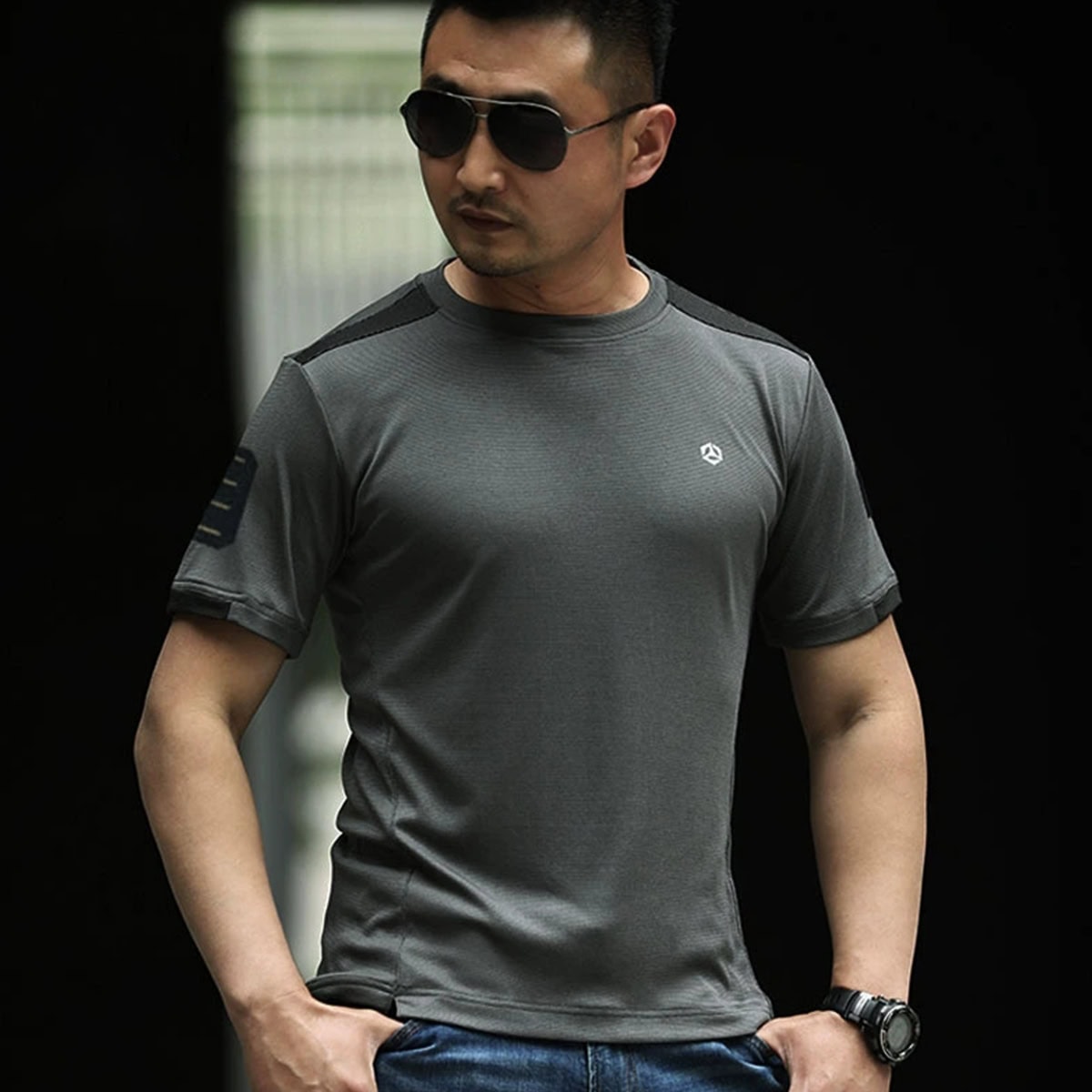 Operator wearing the grey advanced moisture wicking t-shirt, showcasing its professional look and compatibility with tactical gear.