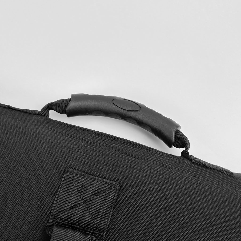 Detail of the ergonomic, comfortable top handle of the Executive Ballistic Briefcase, designed for all-day professional carry.