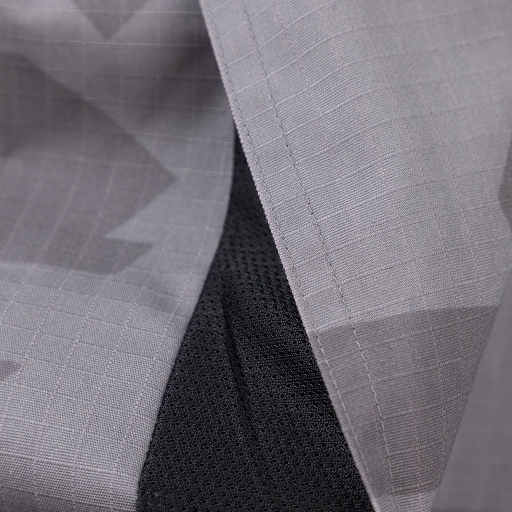 Close-up of the mandarin collar and rip-stop fabric on the Urban Camo ACU jacket.