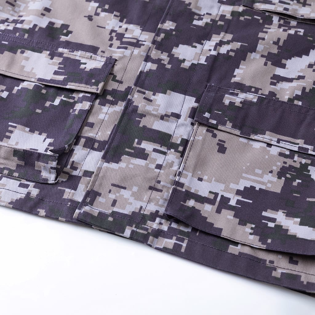 Close-up of the rip-stop fabric on the collar of the Arid Digital Camo BDU, showing the durable weave.