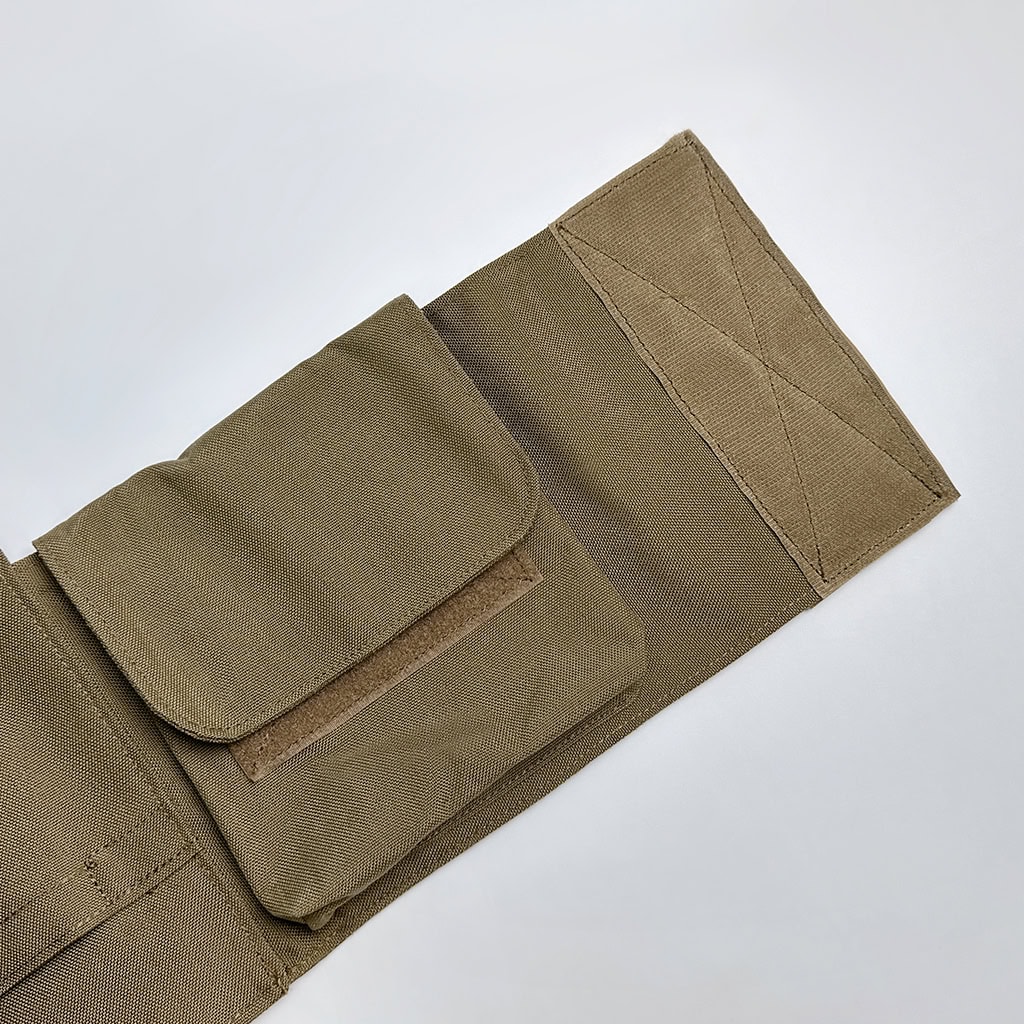Close-up of the adjustable waist and side panel pockets of the First Responder Body Armor, which can hold medical supplies or side armor panels.