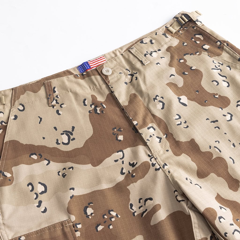 Close-up of the adjustable waistband tabs on the Desert Camo BDU trousers.