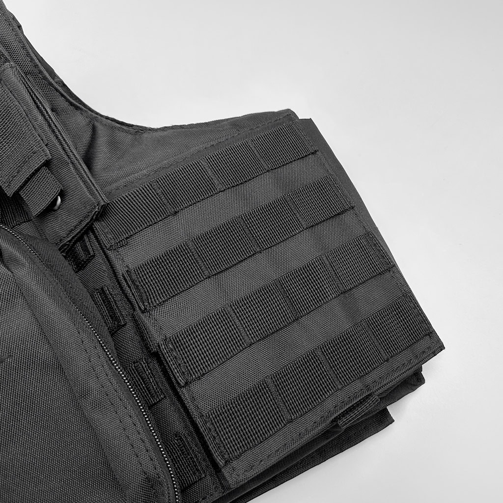 Close-up of the mil-spec MOLLE webbing on the cummerbund of the 6094 modular plate carrier, for attaching additional pouches and gear.