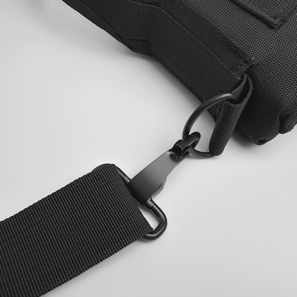 Close-up of the durable, removable shoulder strap and metal hardware on the Urban Defender Covert Ballistic Briefcase.