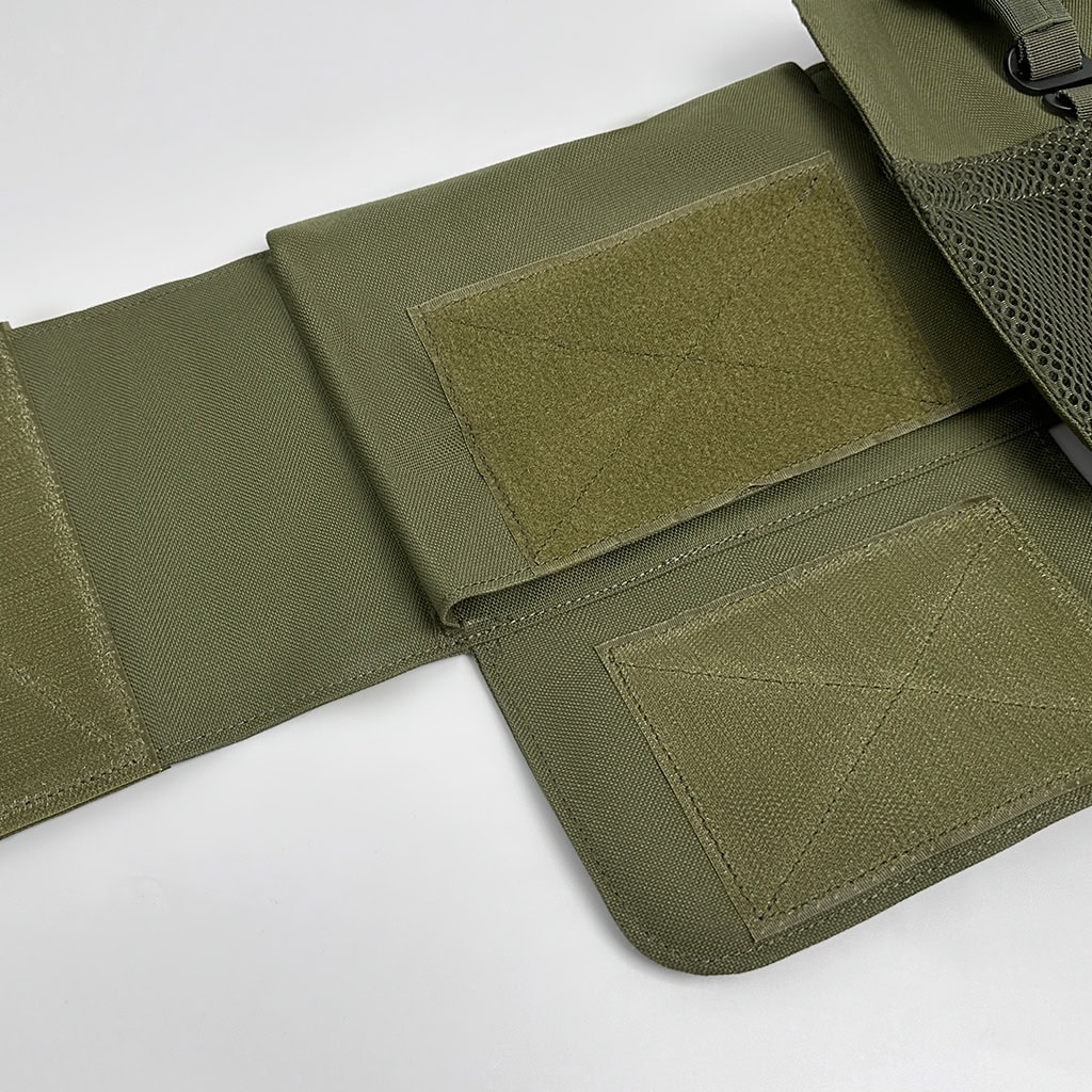 Close-up of the modular side panel (cummerbund) of the Praetorian Full Protection Body Armor, showing the side armor plate pocket and MOLLE webbing.