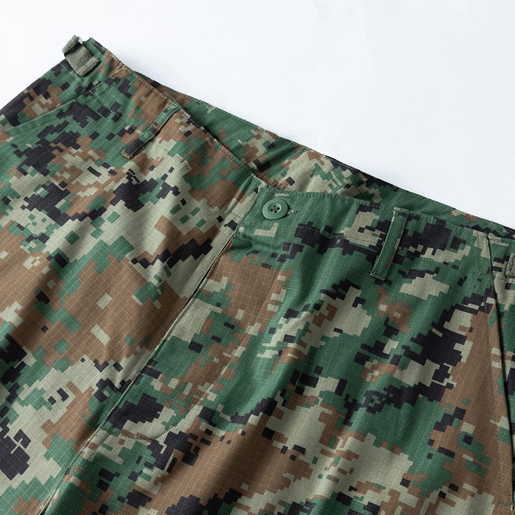Close-up of the durable waistband and button fly on the ACU Combat Uniform trousers.