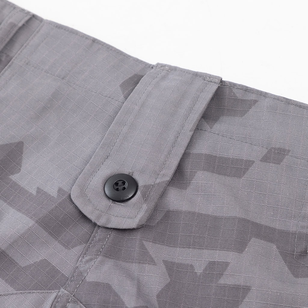 Close-up of the durable waistband and button fly on the Urban Camo ACU trousers.