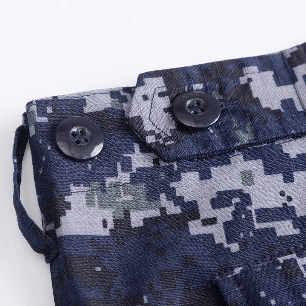 Close-up of the durable waistband and button fly on the Naval Combat Uniform trousers.
