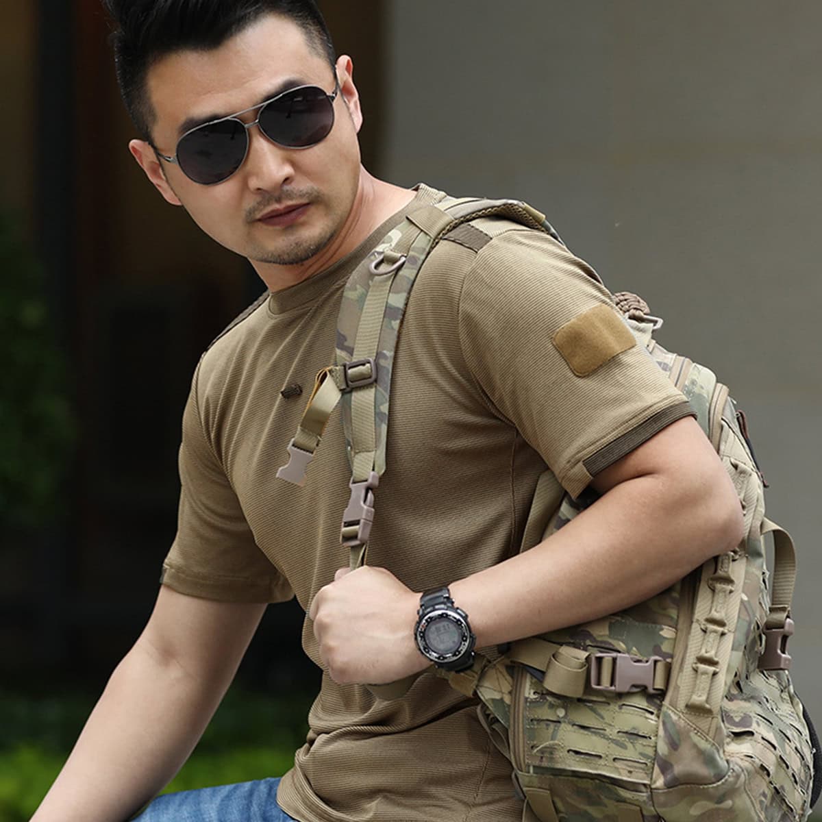 A professional in the coyote brown advanced moisture wicking t-shirt, the ideal base layer for military and special operations personnel in arid environments.
