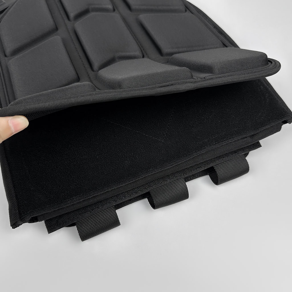 Detail showing the removable, breathable 3D mesh cushion pads on the interior of the Vanguard Quick Release Plate Carrier for enhanced comfort and airflow.