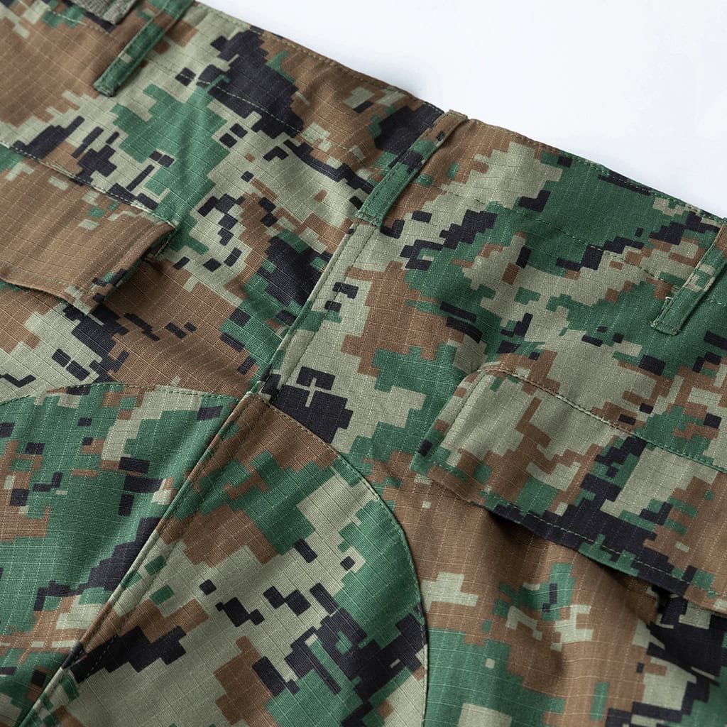 Close-up of the large, forward-tilting cargo pocket on the ACU Combat Uniform trousers.