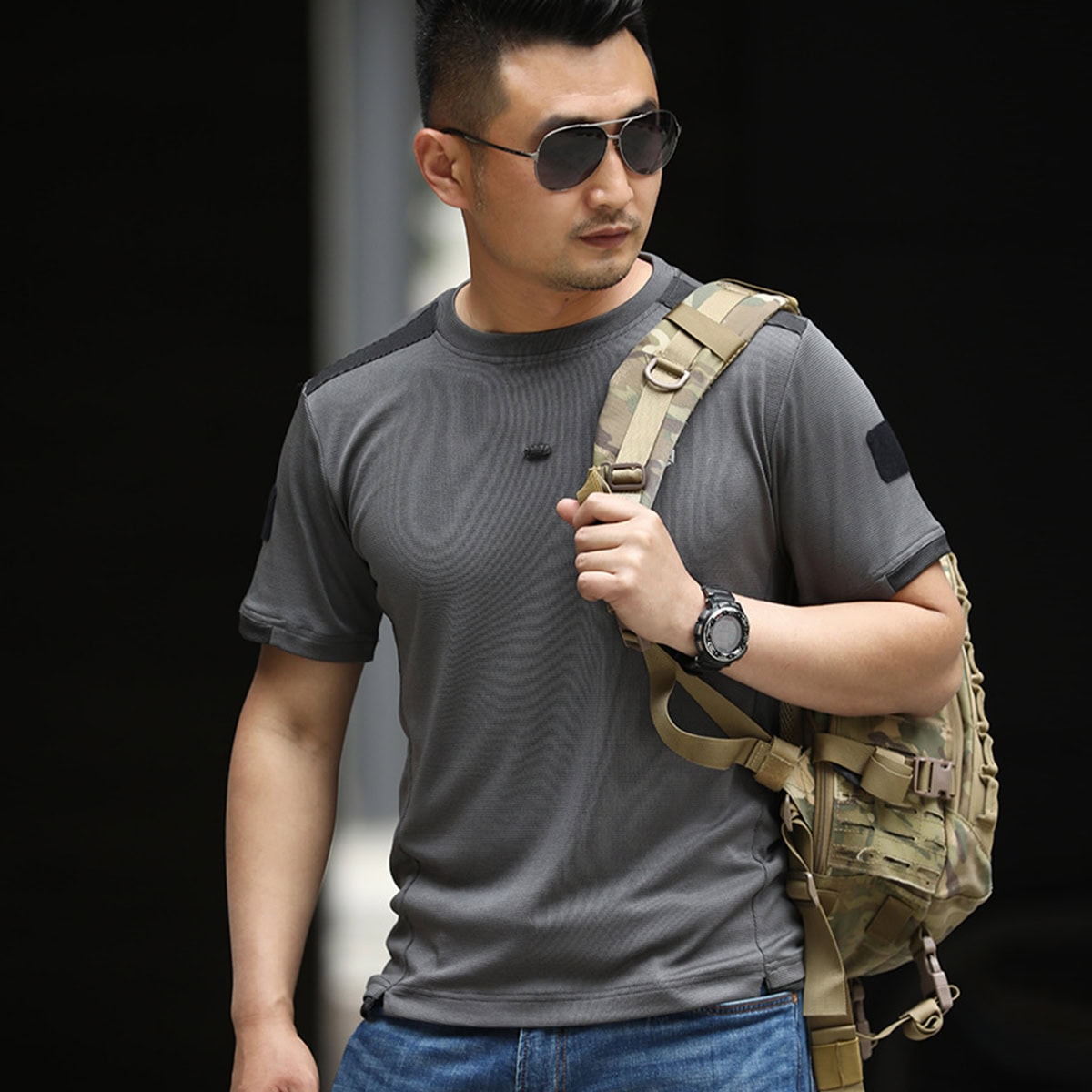 Operator wearing the grey advanced moisture wicking t-shirt, showcasing its professional look and compatibility with tactical gear.