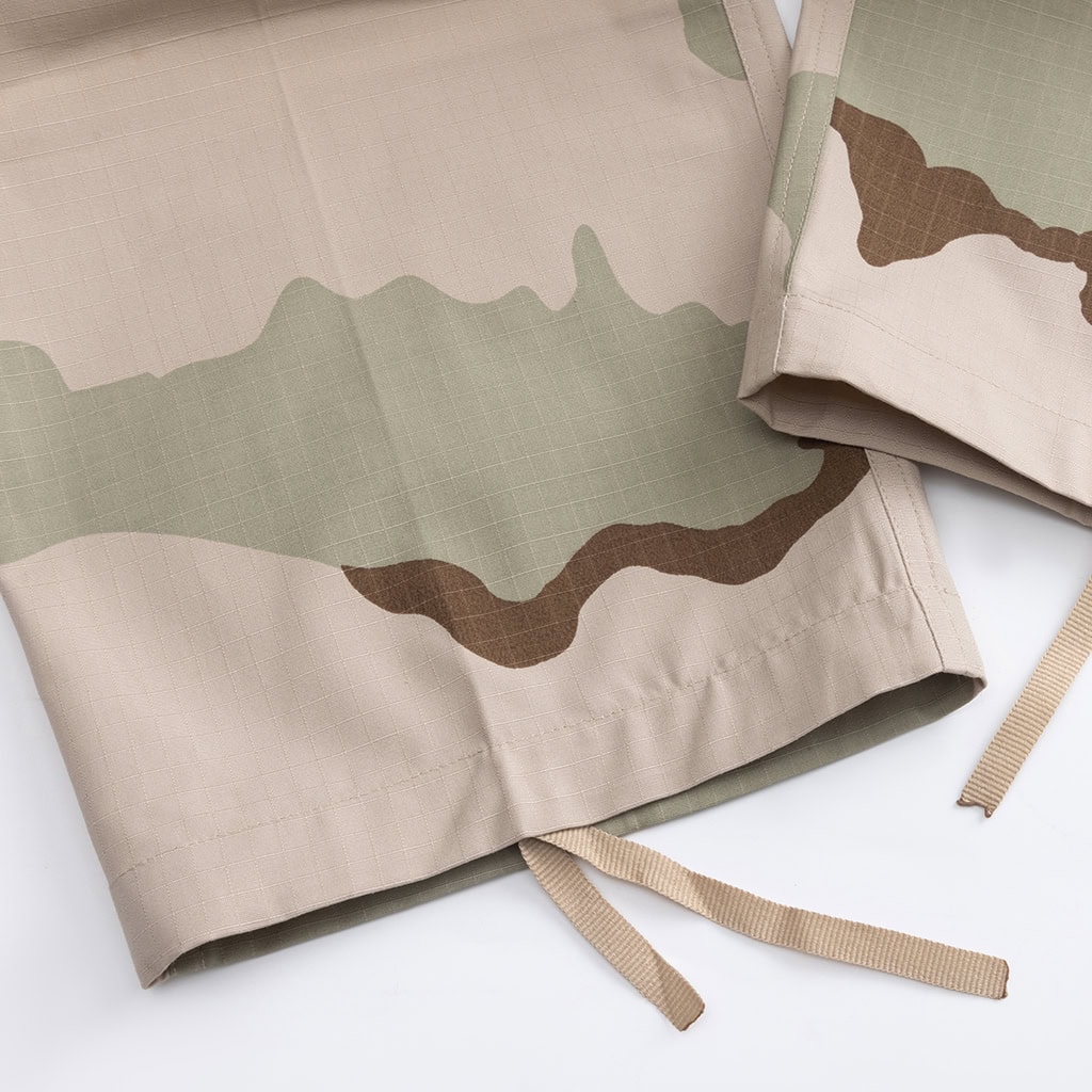 Close-up of the drawstring leg opening on the 3-Color Desert BDU trousers for blousing over boots.