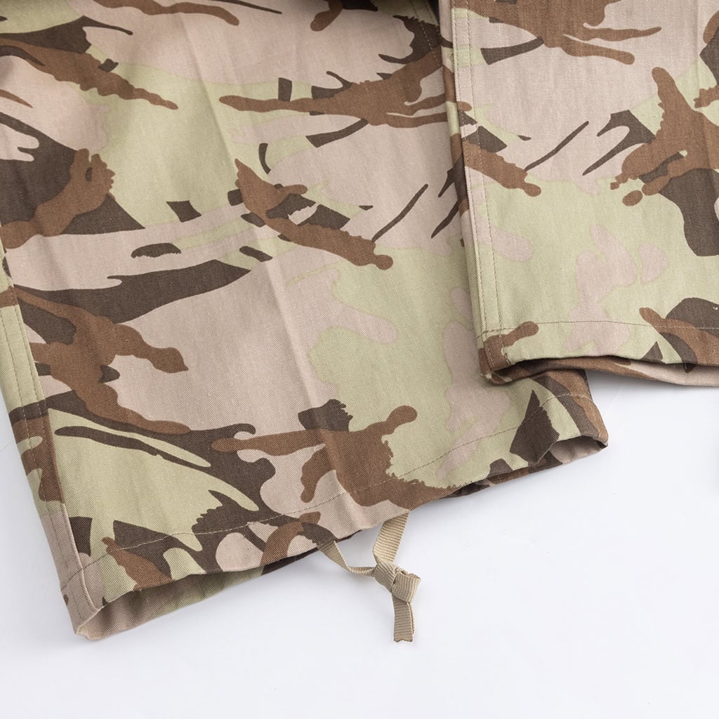 Close-up of the drawstring leg opening on the Sentinel heavy-duty trousers for blousing over boots.