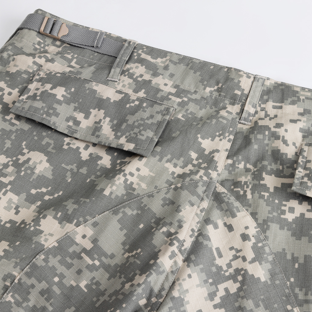 Detail of the side cargo pocket and adjustable waist strap on the custom digital camo ACU combat pants.