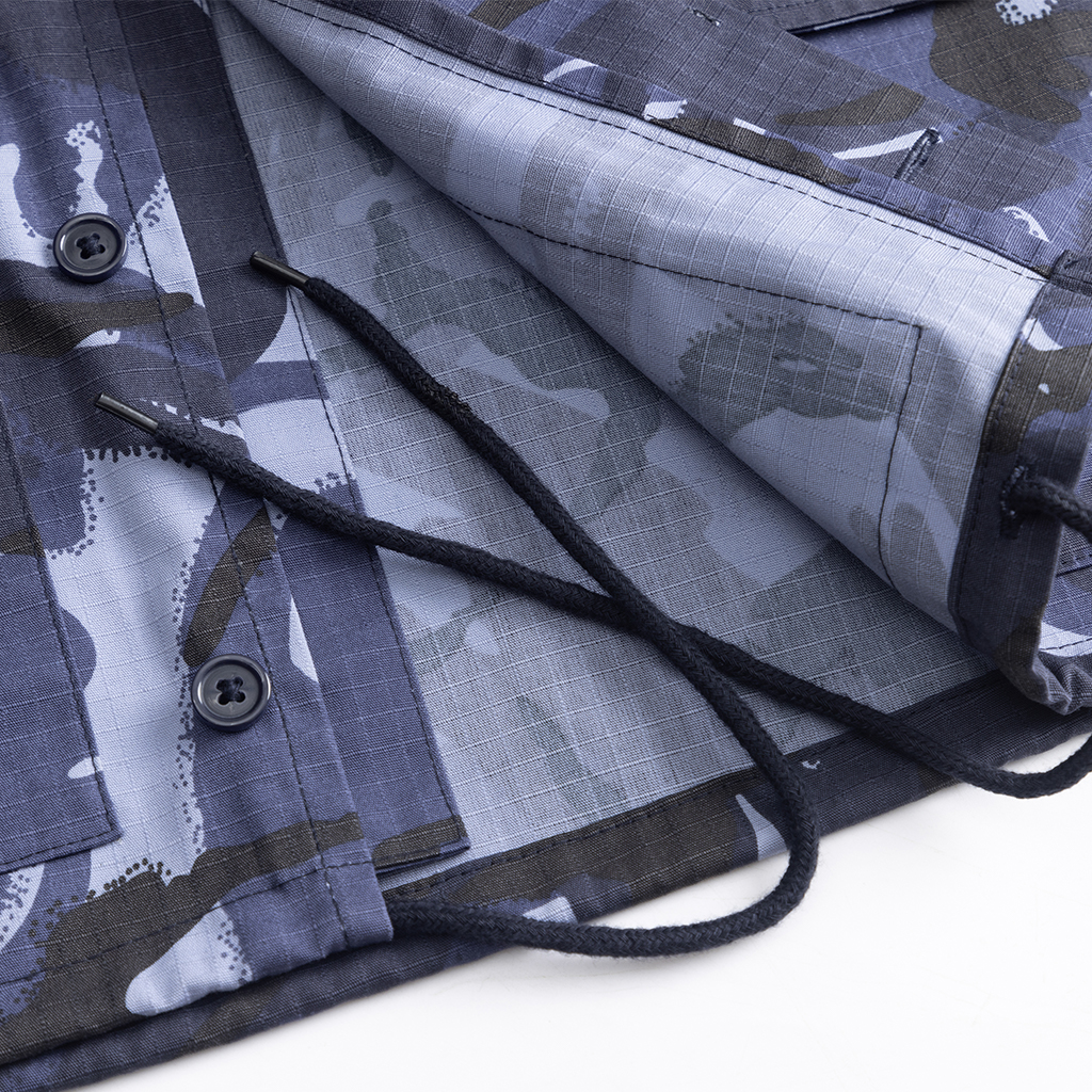 Detail of the drawstring ankle closure on the custom blue camo combat uniform trousers for a secure fit.