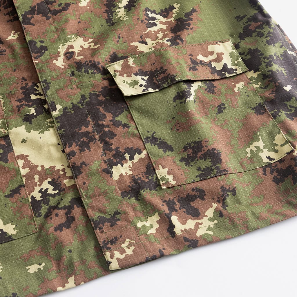 Close-up of the breast pocket and velcro patch area on the custom Italian vegetato combat uniform jacket.