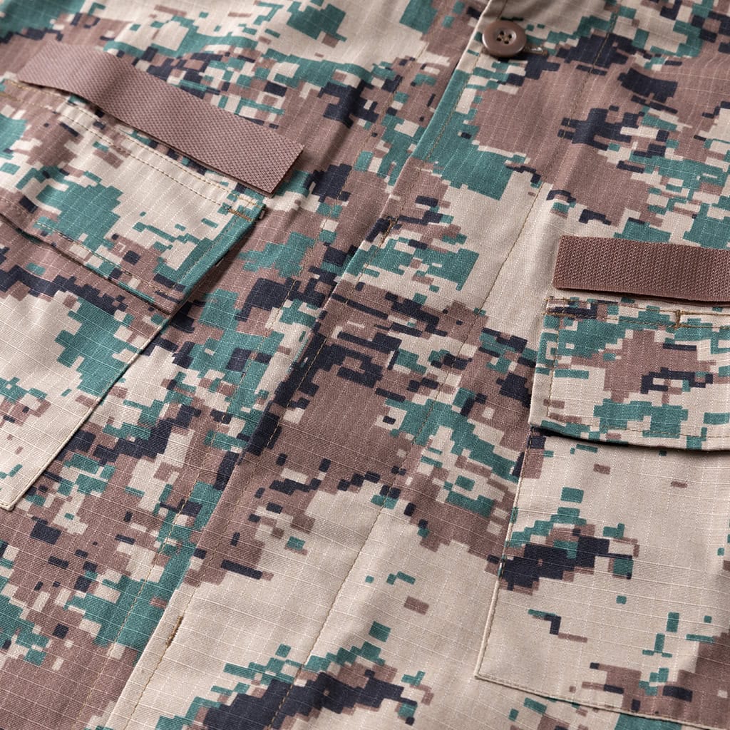 Close-up of the angled breast pockets on the custom Jordanian digital camo combat uniform jacket.