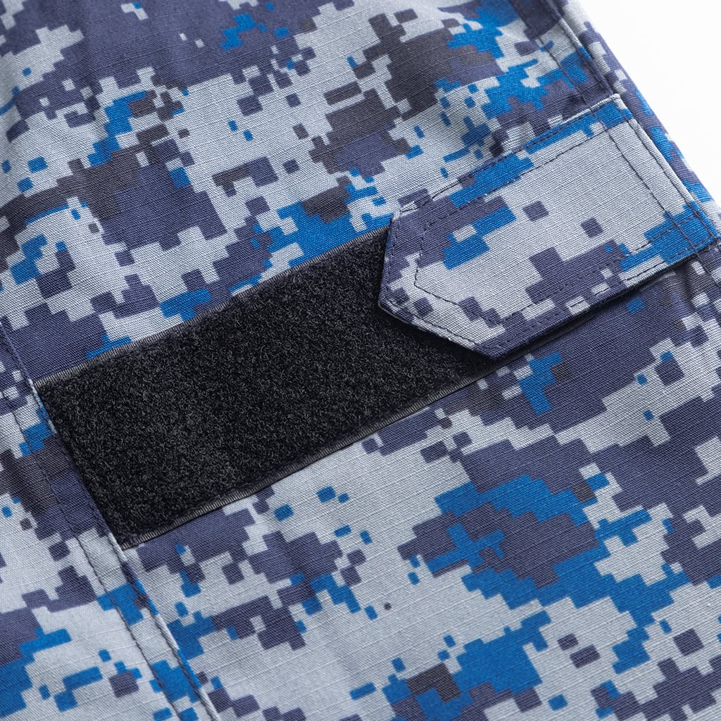 Close-up of the velcro patch and pocket flap on the custom Malaysian blue digital camo uniform jacket.