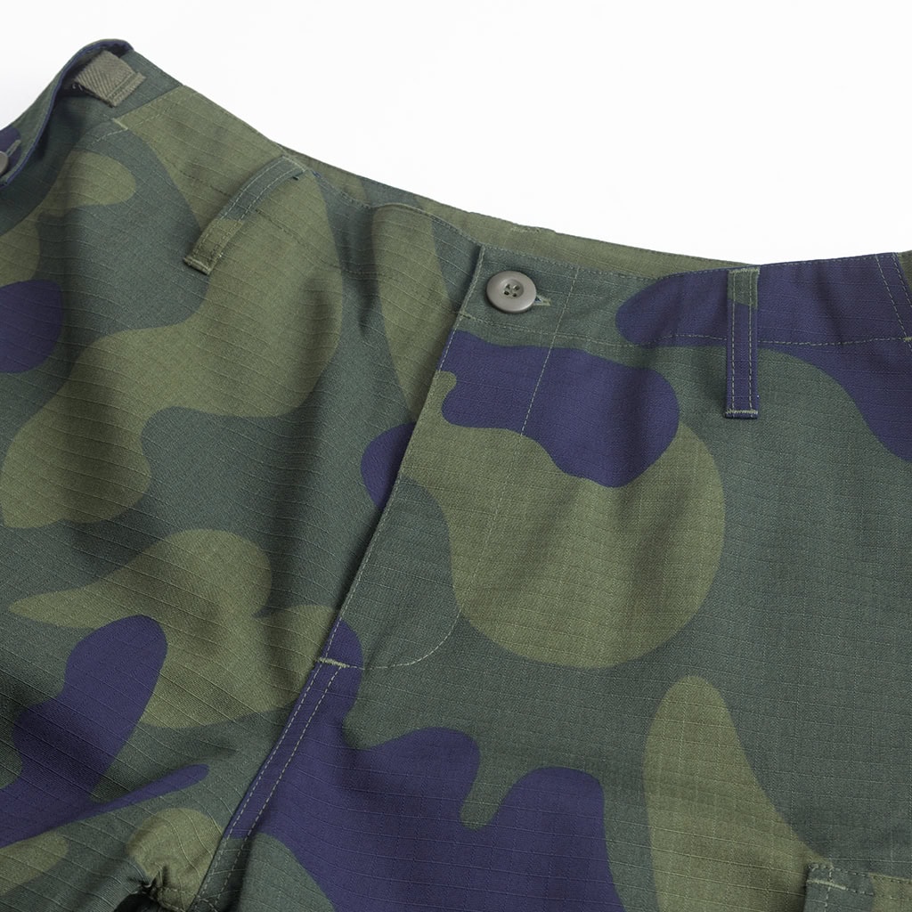 Detail of the button-fly and waist construction on the custom DRC green camo uniform trousers.