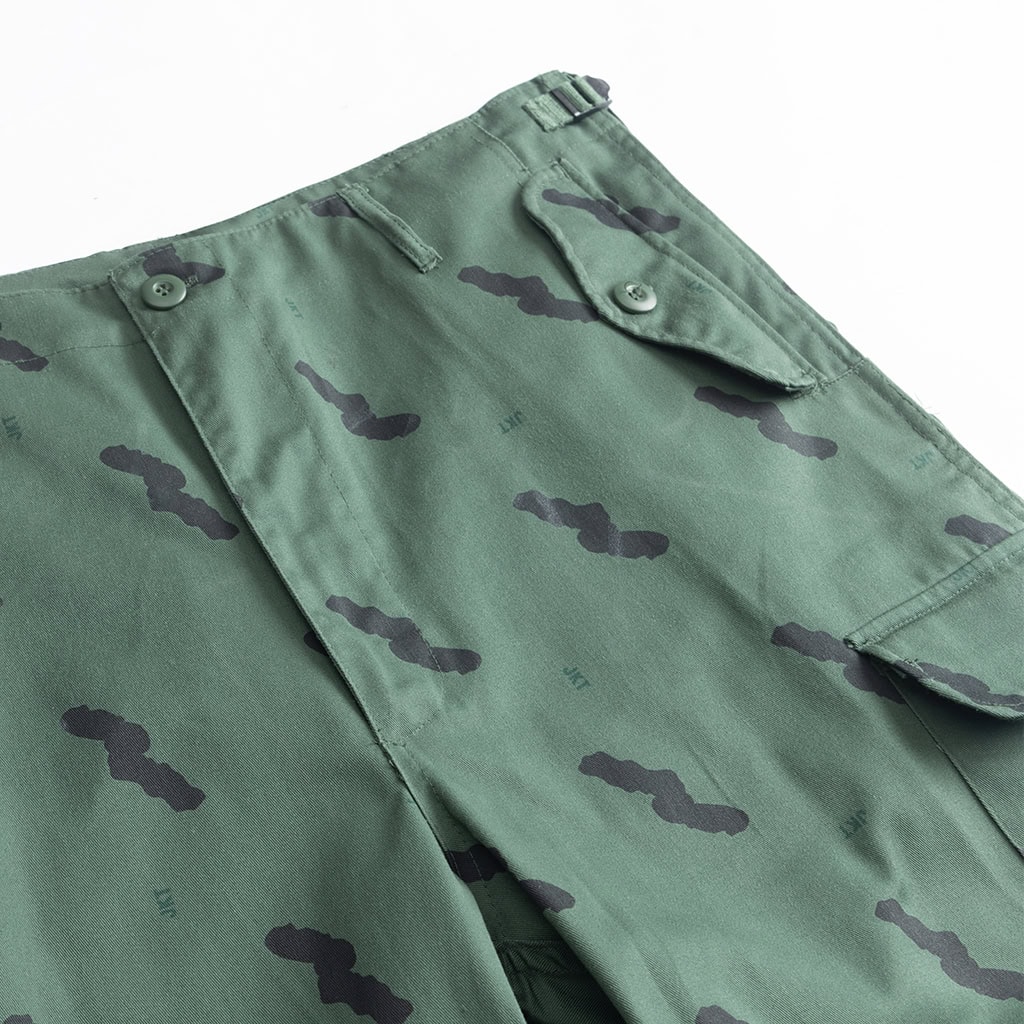 Close-up of the reinforced seat and back pocket on the custom Tanzanian green camo uniform trousers.