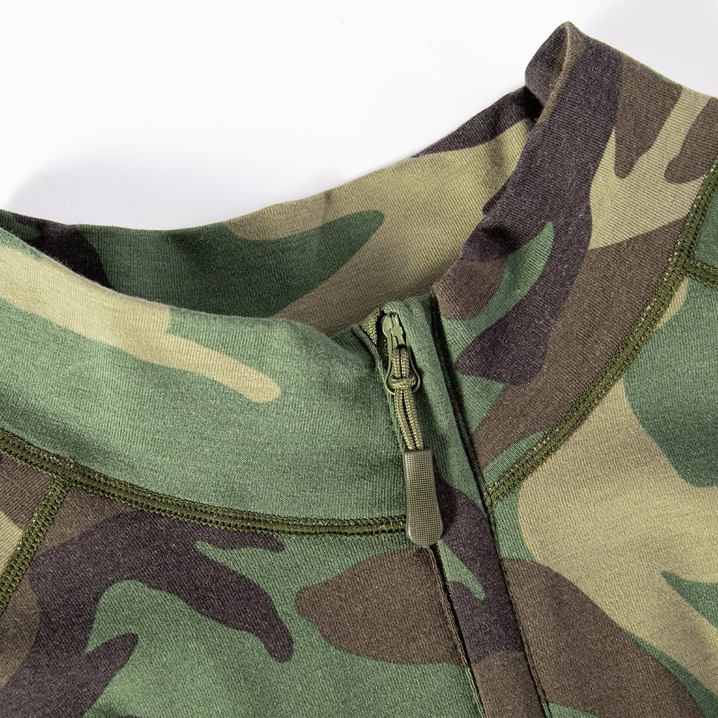 Close-up of the quarter-zip stand-up collar on the custom woodland camo G4 combat shirt.