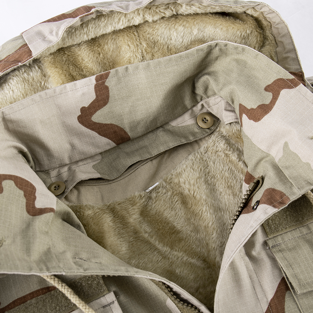 Close-up of the collar on the custom tri-color desert M65 jacket, showing the button-in fleece liner for warmth.